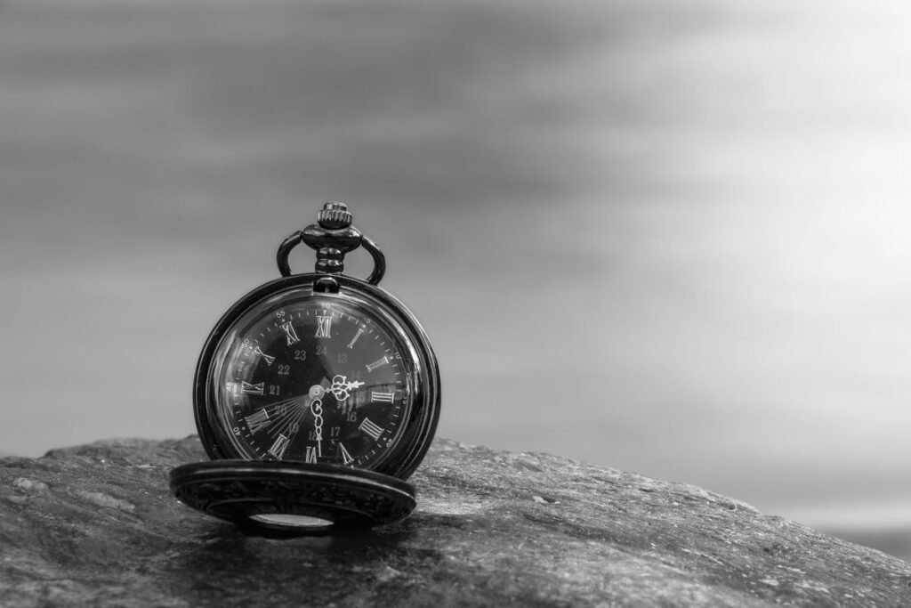 Antique pocket watch, black and white