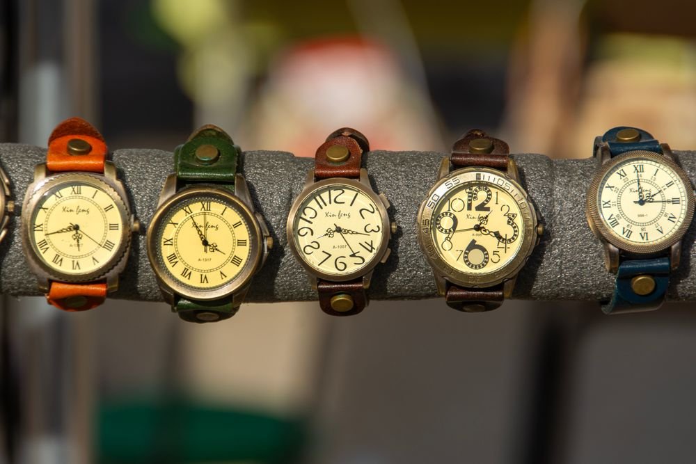 A row of wristwatches on display